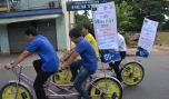 Đi xe đạp tuyên truyền hường ứng Giờ Trái đất. Ảnh minh họa: Như Lam