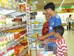 Người dân mua sắm sau Tết tại Co.op Mart Mỹ Tho.