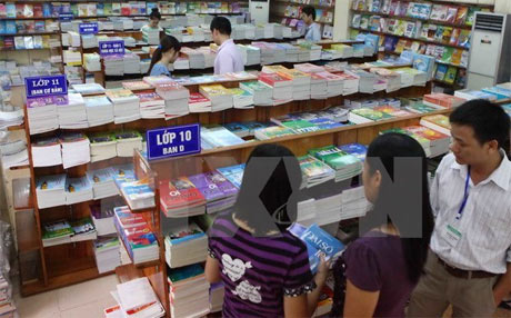 Bộ đang tích cực xây dựng chương trình, sách giáo khoa mới để áp dụng từ năm học 2018-2019. Ảnh: Quý Trung/TTXVN