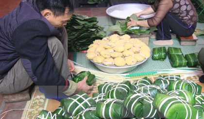 Bánh chưng - Một loại thực phẩm không thể thiếu trong dịp Tết. Ảnh: TTXVN