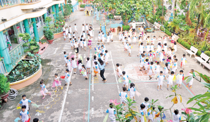 Giờ thể dục buổi sáng ở Trường Mầm non Bông Sen. Ảnh: ĐÌNH HẢI