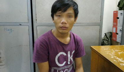 Đối tượng Lê Thái Hòa tại cơ quan công an.